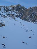 Pedro strapping crampons at the base of TNF of Peak 13,333 Pedro strapping crampons at the base of TNF of Peak 13,333